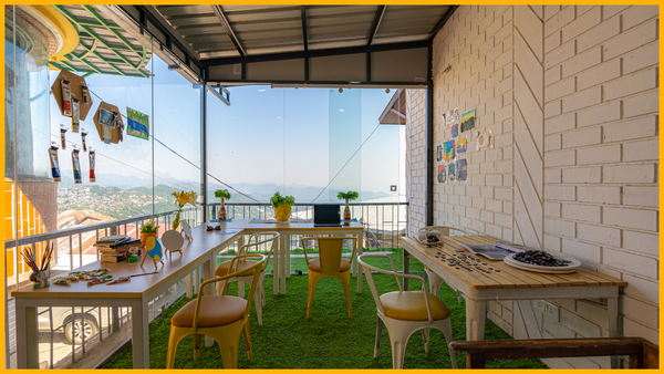 Escape - the - Office , Your Wacky Workation Adventure with ArtBuzz Hostels! 🌴💼